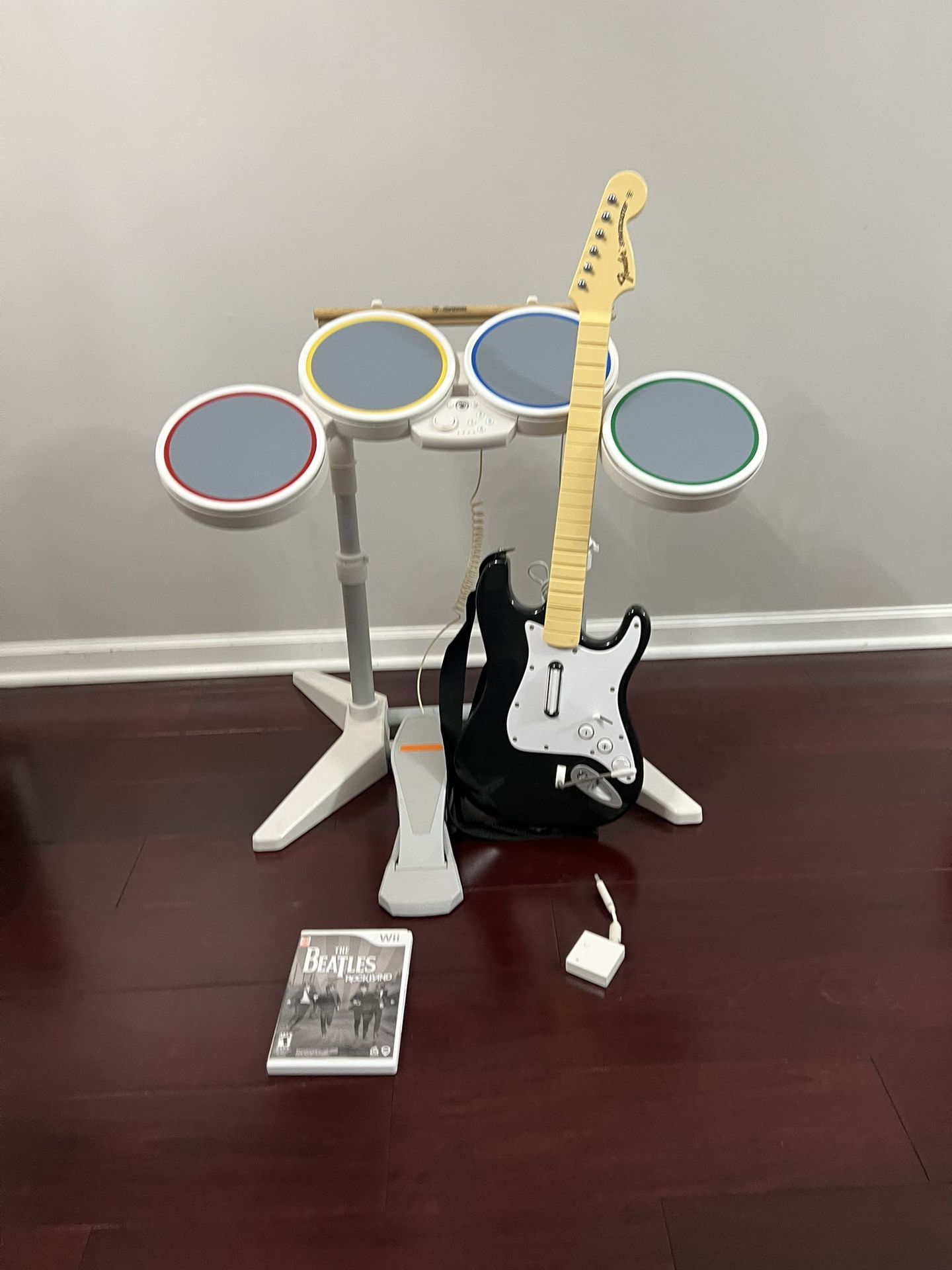 Nintendo Wii Rock band ( wired drums, guitar, dongel, sticks, pedal and game)