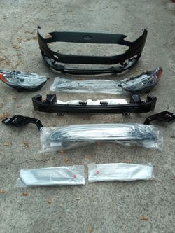 2017 Ford fusion front bumper ,grill core and head lights all  brand-new
