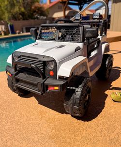Electric Vehicle White Jeep