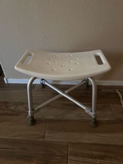 Adjustable shower chair