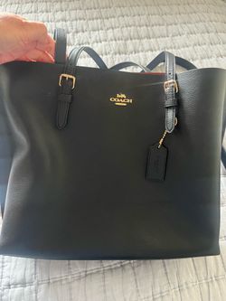 Coach black purse $100