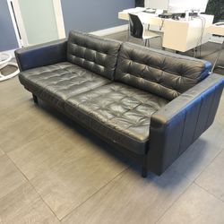 Black leather sofa