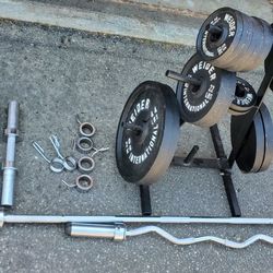325 pounds of olympic weights, bars and plate tree!