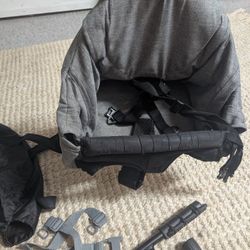 New Never Used - clip-on or hook-on high chair — portable baby/toddler seat that attaches securely to a table edge.
