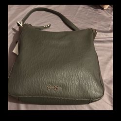 Jessica Simpson charcoal gray shoulder purse. 