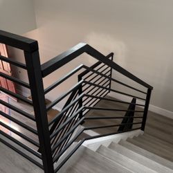 Wood With Iron Handrails 