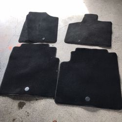 Dodge/Chrysler Floor mats front and passenger and second row rear buckets