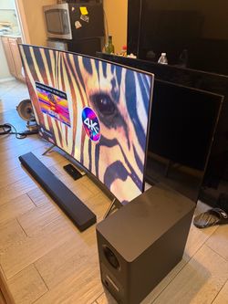 Samsung 65” CURVED UN65MU8500F 4k UHD HDR Crystal Smart tv with Monster Subwoofer and sound bar.