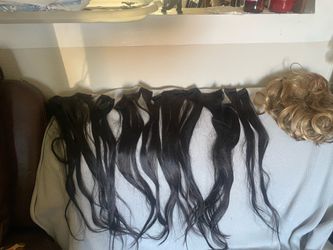 Nice clip in 100% human hair for beauty 18  “ 9 pieces black color & one medium size blond , gold color $ 40