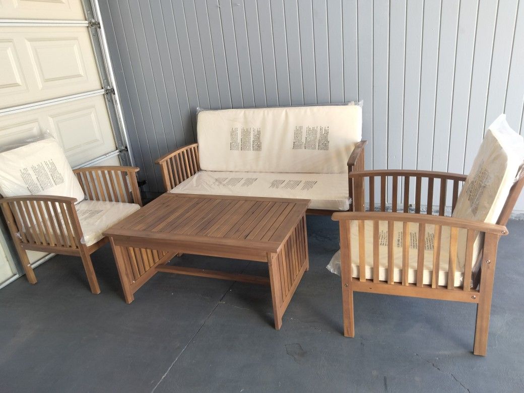 Outdoor patio wood sofa with chairs and coffee table
