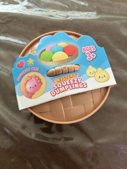 Squeezy Dumplings $6