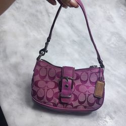 Vintage Coach Hampton Demi Pouch baguette bag in the pink signature canvas and leather. 