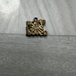 Vintage You Are Loved Charm Gold Goldtone   Vintage condition  some discoloration  will be shipped in an envelope.  Please feel free to ask questions 