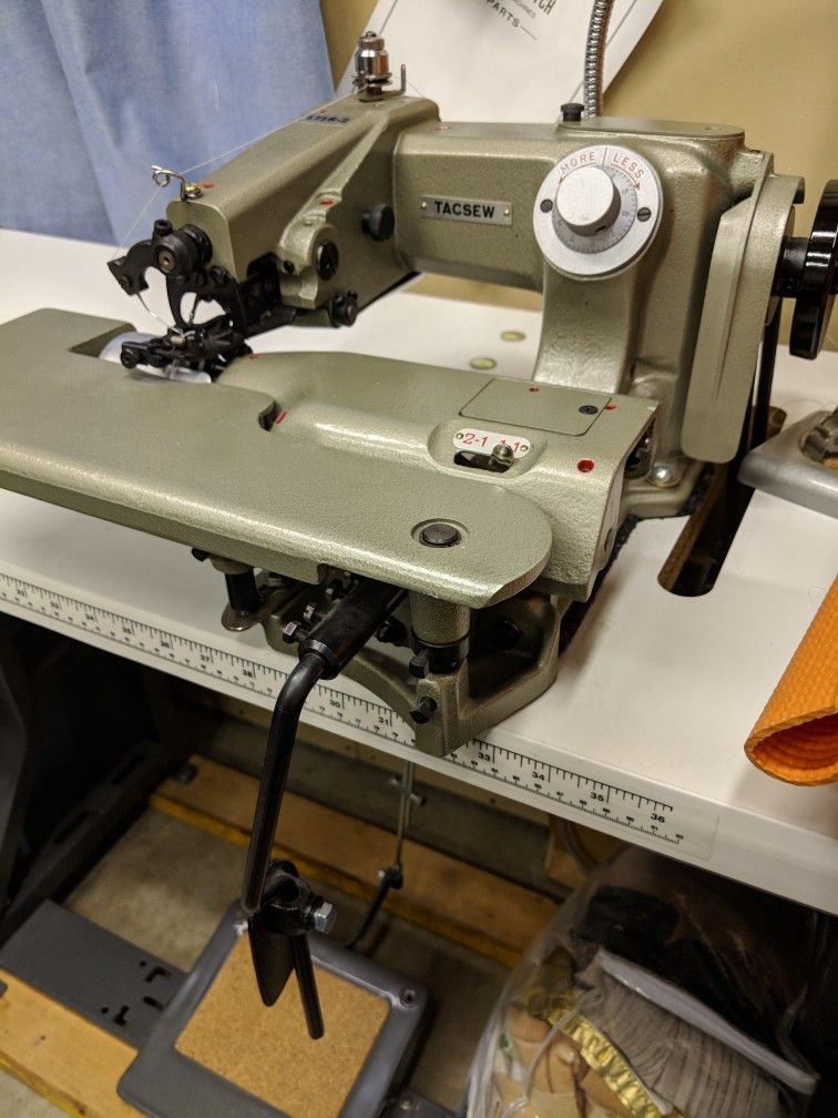 Tacsew blind hemming industrial sewing machine model T1718-2 with motor and table.