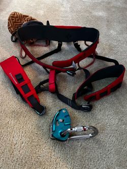 Climbing harness and belay device