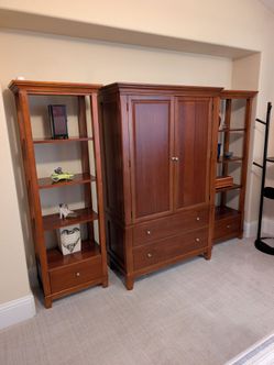 Must sell today! Armoire and matching shelf towers