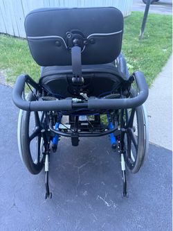 Wheelchair with tilting black
