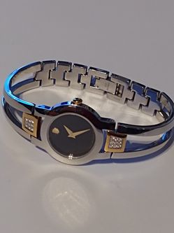 Movado Amorosa Two Tone Black Dial Diamond Women's Watch 0604983 - Retail value $1,195.00.