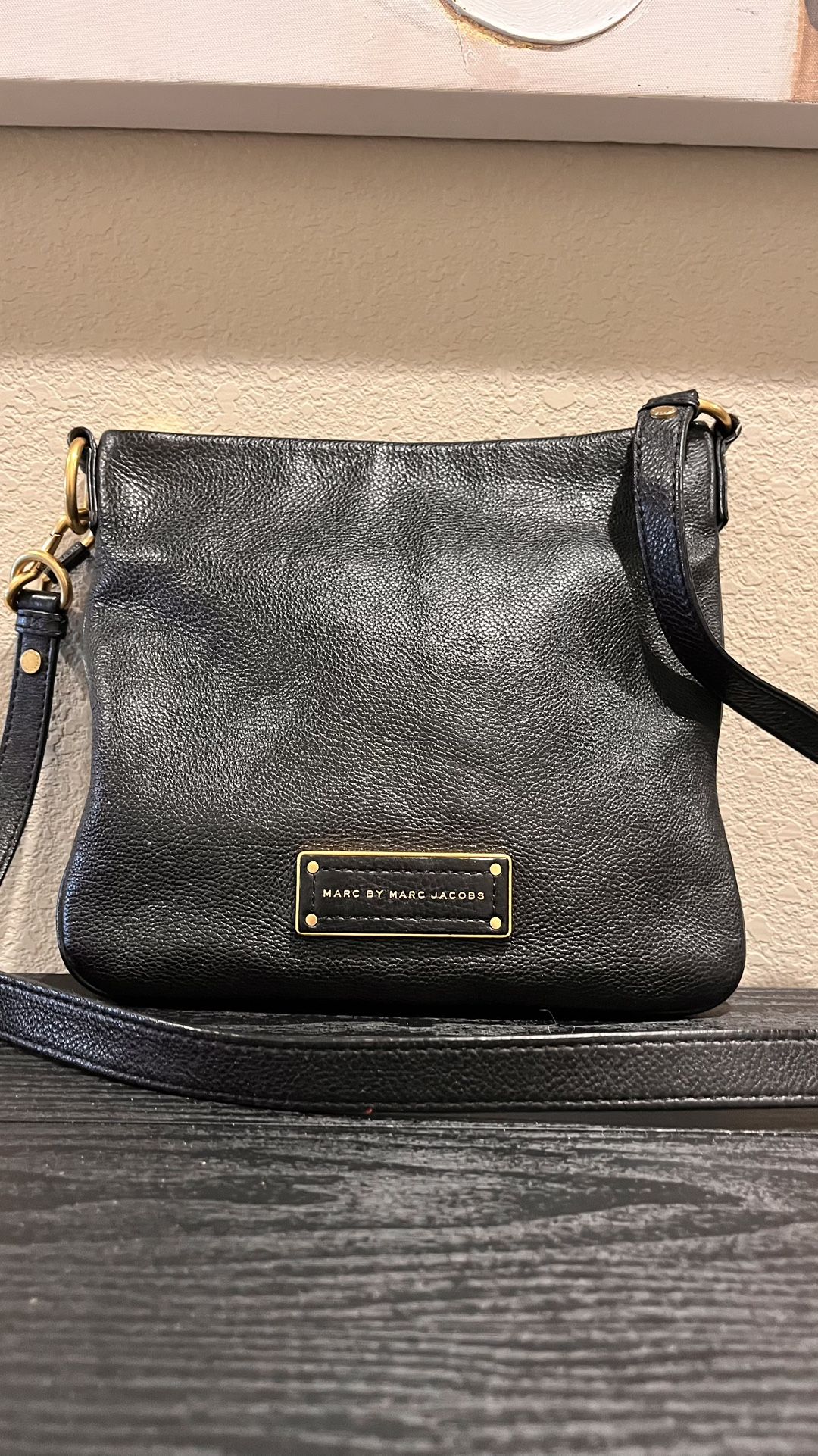 The product in the image is a Marc by Marc Jacobs Classic Q Natasha Crossbody Bag
