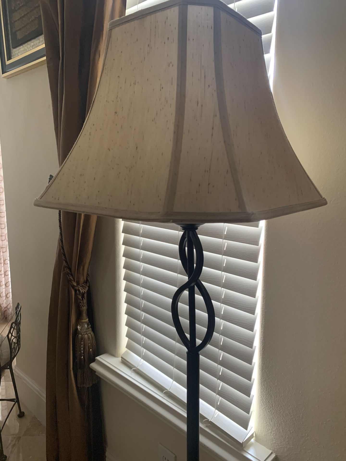 Bronze metal base floor lamp with cream shade. Bought for $75. Looks like new.