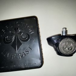50% Affliction cologne missing lid & different tin box