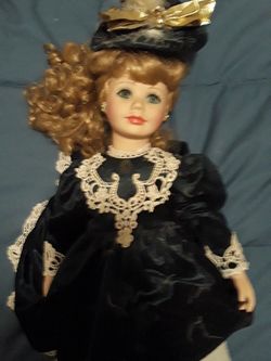 Vintage musical porrcelien doll