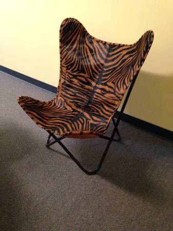 NEW! Brown zebra print butterfly chair. Cow hide leather.

