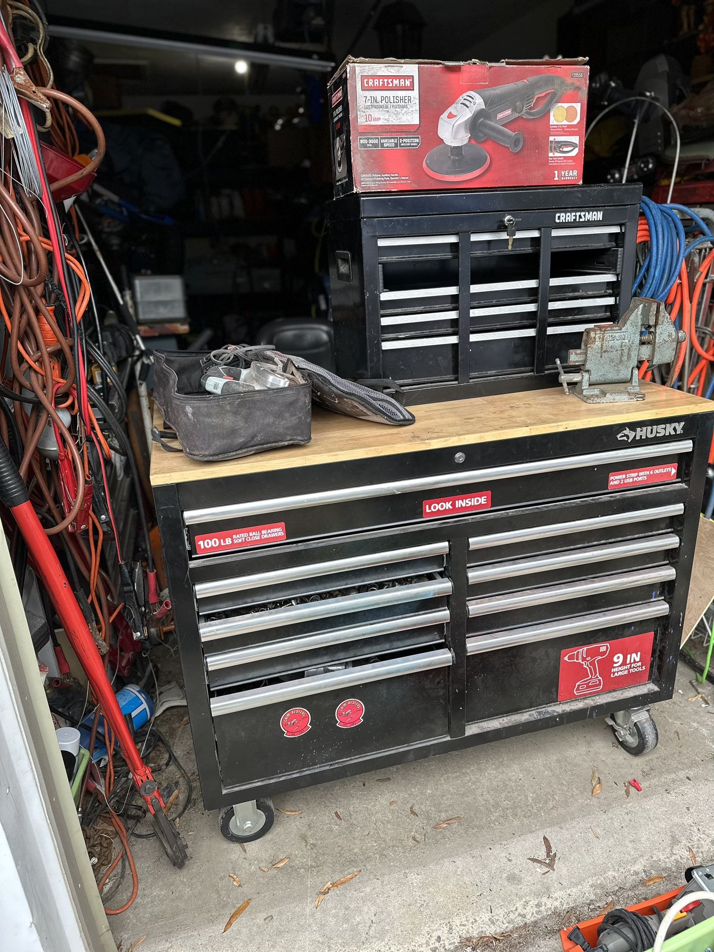 Lots Of Tools In Tool Box With Electrical outlet With Saws, Polisher, And Vice