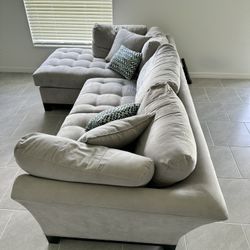 Gray Sofa With Chaise Lounge On Left Side 