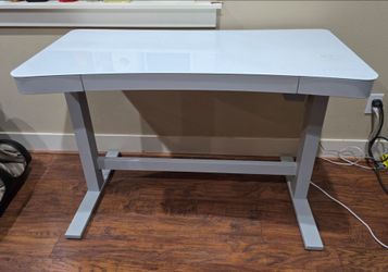 Adjustable height desk