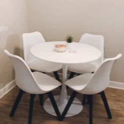 White Modern Dining Table with Tulip Pedestal set with 4 chairs