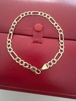14K FIGARO BRACELET SIZE 71/2
