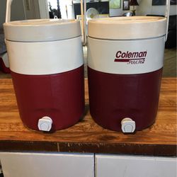 Two Coleman drink coolers