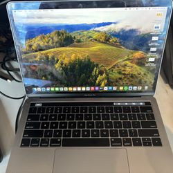 Apple MacBook Pro (13″, 1.4 GHz Quad-Core Intel i5, 8 GB RAM)