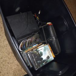 Box Full Of DVD Players And A Bunch Of DVDs