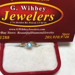 14 Kt ,real Gold, “childs “ Ring Blue Topaz