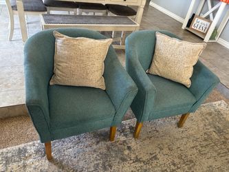 Pair of Teal Barrel Accent Chairs with Pillows