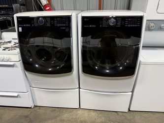 LG jumbo white front load washer and gas dryer set