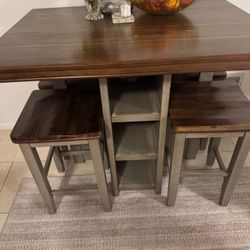 Dinning Table With 4 Stools And Storage 