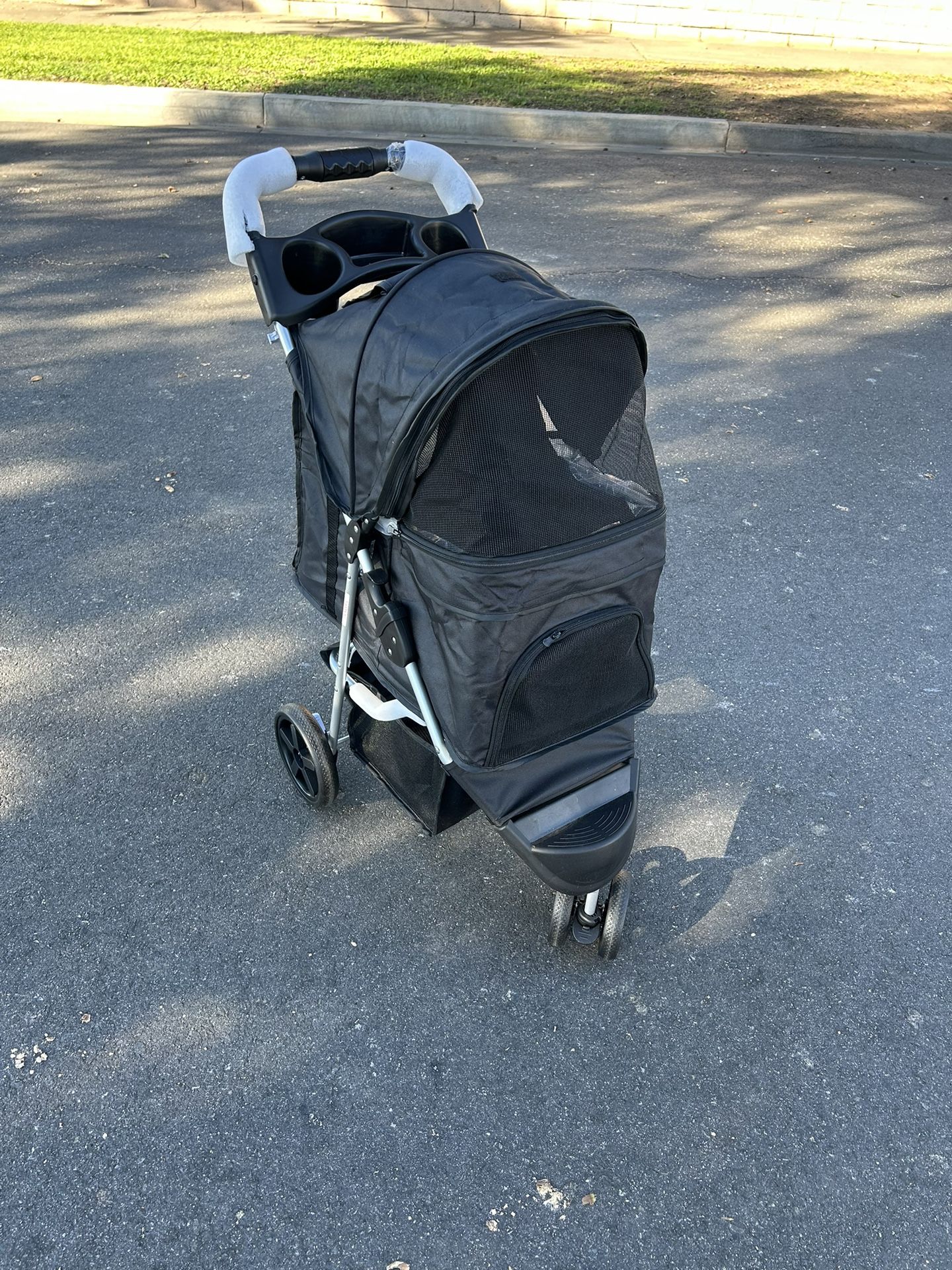Brand new pet stroller plus a free Collapsible Dog Crate