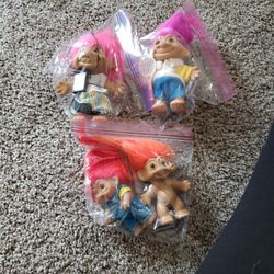 Troll Dolls. Each
