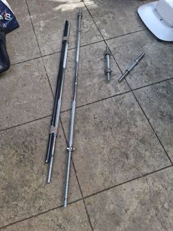 3 long lifting bars and 2 hand held bars