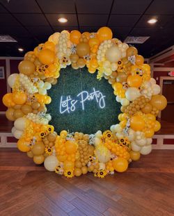 Luxury Balloon Backdrop with Neon Sign & Flowers