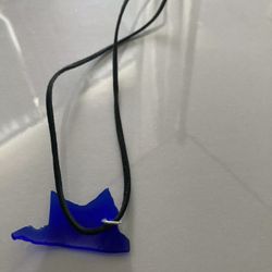 Blue glass pendant necklace on 25” cord