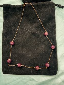 14 k gold necklace with Ruby beads