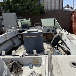 Boat. Needs TLC. Good Motor