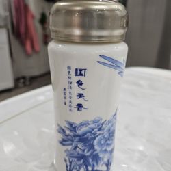 Never used beautiful ceramic tumbler.