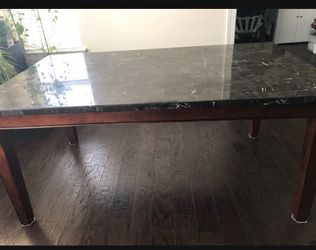 Contemporary marble top hardwood dining table (table only). Seat upto 6 people. 66* 39
