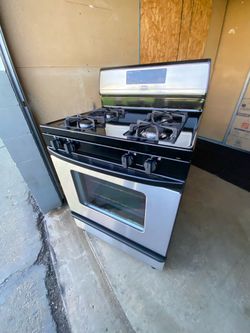 Whirlpool gas stove 4 burners stainless st. 30”