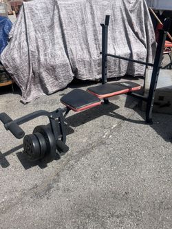 bench press with leg developer attachment and weights included, 